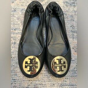 7.5 black Tory Burch slides. Gently worn . No flaws